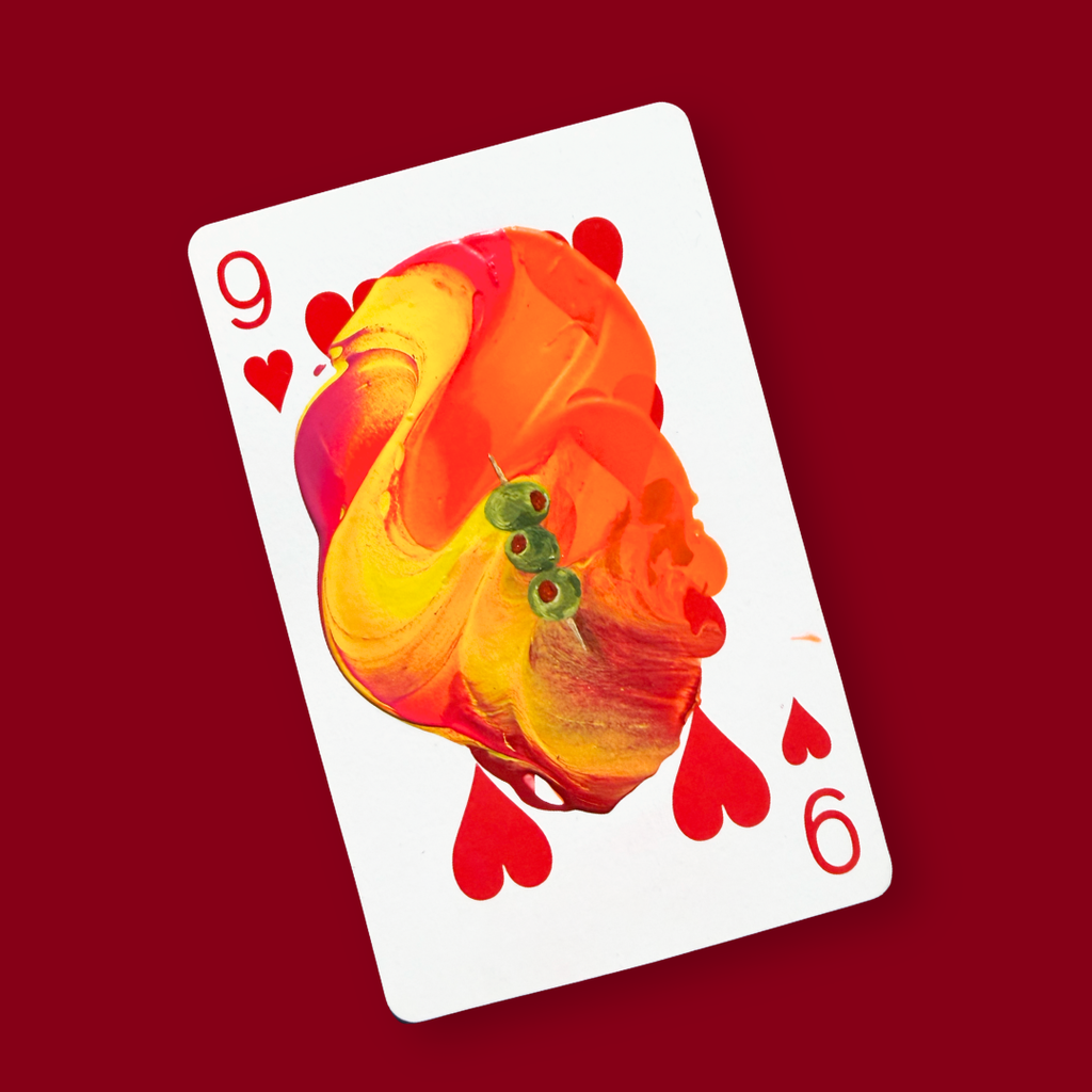 Olive by Hira A., acrylic on a 9 of Hearts playing card, close-up