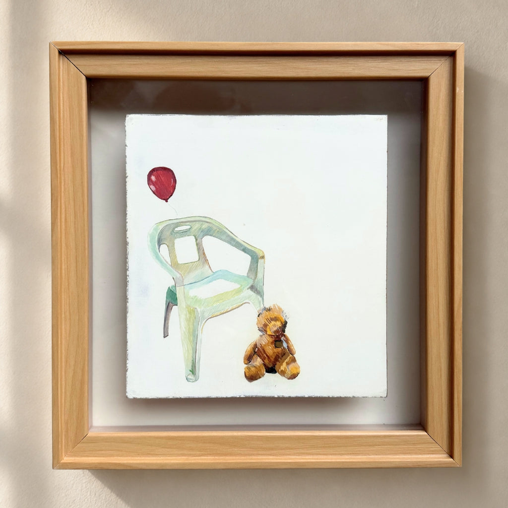 The Weight of Absence — front view, egg tempera teddy bear, broken chair and red balloon in natural oak shadow box